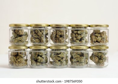 Cannabis drying and curing. Marihuana buds in glass jars. Eco storage. Medicinal marijuana usage. Hemp recreation concept. 