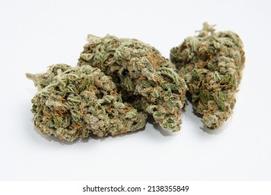 Cannabis flowers, macro view, isolated. Layout of marijuana buds on white background. Hemp growing concept, drying and curing. 