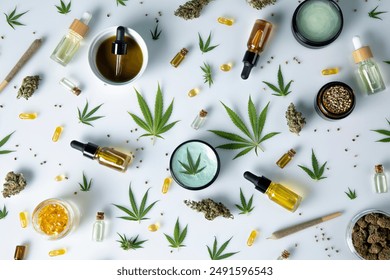 Cannabis hemp oil bottle with hemp seeds, hemp leaf, cannabis oil and marijuana