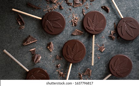 Cannabis infused chocolate lollipops with THC and CBD oil.