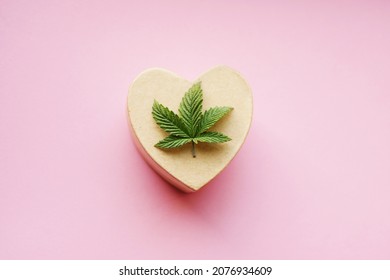 Cannabis Leaf On Heart-shaped Gift Box. Valentine's Day Sale. Top View 