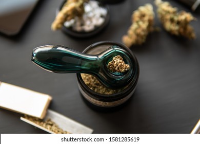 Cannabis Legalisation. CBD And THC On Buds In Cannabis. Macro Cannabis Buds Weed On Black Wood Background. Marijuana Smoking Pipe