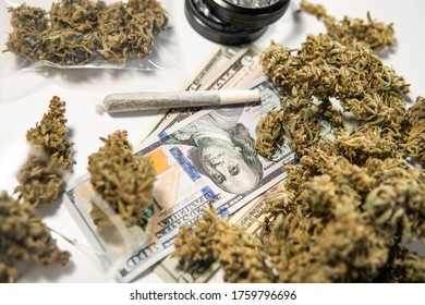 Cannabis Money Black Market. Cannabis In Economics. Marijuana Bud And Banknotes Of Dollars.