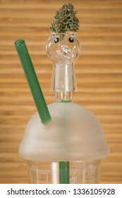 Cannabis Nug Perched On Top Of A Dab Rig