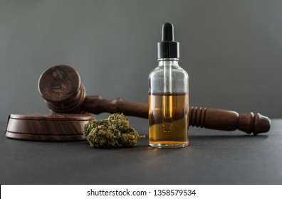 Cannabis, Oil In A Bottle And A Gavel 