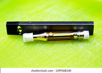 Cannabis Oil, Disposable Vape Cartridge. Vaping Marijuana, THC And CBD