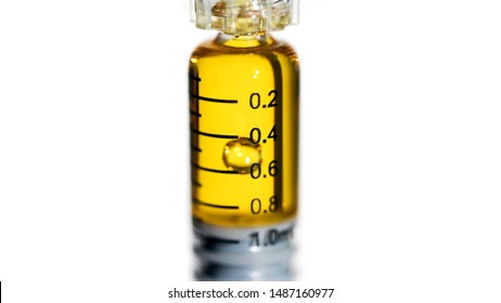Cannabis Oil, for Vaping with Vape Pen, in Syringe on White Background. 