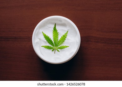 Cannabis Ointment Natural Product. Cosmetic Cream From Natural Hemp, Moisturizing Lotion With CBD Content. Copy Space For Your Design