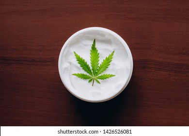 Cannabis Ointment Natural Product. Cosmetic Cream From Natural Hemp, Moisturizing Lotion With CBD Content. Copy Space For Your Design