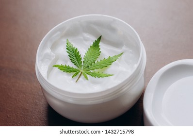 Cannabis Ointment Natural Product. Cosmetic Cream From Natural Hemp, Moisturizing Lotion With CBD Content. Copy Space For Your Design