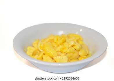 Canned ackee fruit, in a bowl isolated white background 