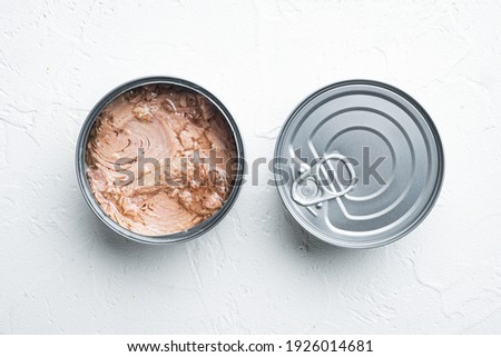 Canned Albacore Wild Tuna set, in tin can, on white background, top view flat lay