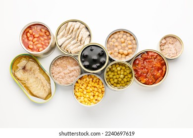 Canned food on a white background, a donation for people in crisis, long-term storage stocks. - Shutterstock ID 2240697619