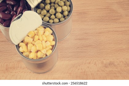 Canned Food On Wooden Background