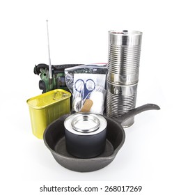 Canned Foods, Emergency Radio And Supplies For Disaster Preparedness On White Background