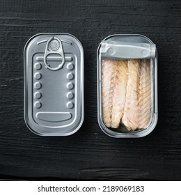 Canned Mackerel  Fillet, Fish Preserves Set, In Tin Can, On Black Wooden Table Background, Top View Flat Lay, Square Format