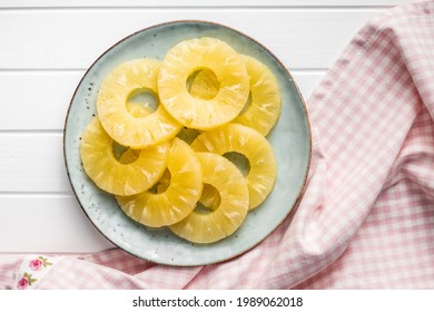 Canned Sliced Pineapple Fruit On Plate. Top View.