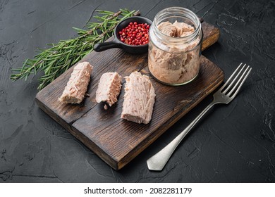 Canned Tuna Fillet Meat In Olive Oil, On Black Background