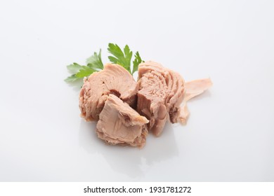 Canned Tuna Fish On White Plate With Salad

