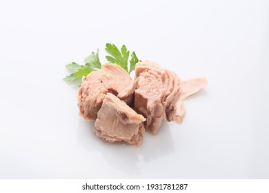 Canned Tuna Fish On White Plate With Salad

