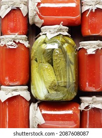 Canned Vegetables: Tomato Paste And Pickled Cucumbers, Food In Plastic Free Sustainable Jars On Wooden Rustic Table, Conserves  For Winter Eat, Flat Lay, From Above Overhead Top View