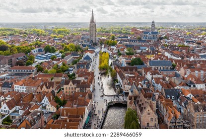 Cannel in Bruges. Aerial drone shot of Brugge is the Beautiful Medieval Historical City. Architecture and channels.