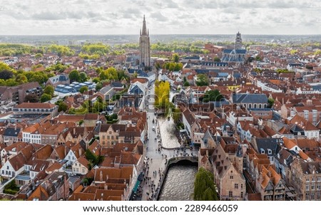 Cannel in Bruges. Aerial drone shot of Brugge is the Beautiful Medieval Historical City. Architecture and channels.