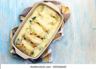 Cannelloni With Zucchini, Spinach, Ham, Cheese With Béchamel Sauce.