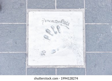 CANNES, FRANCE - AUGUST 15: The Imprint Of The Hand Of The Famous Director Francesco Rosi On The Sidewalk In Front Of The Palais Des Festivals Et Des Congres, Cannes, France, August 15, 2019
