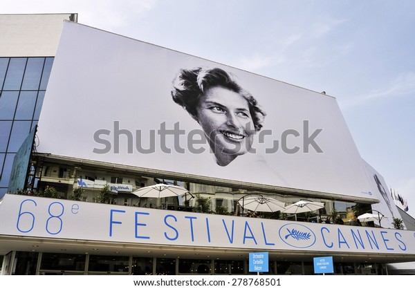 CANNES, FRANCE - MAY 14: Facade of\
the Palais des Festivals with the billboard of the 68 edition of\
the Cannes Film Festival on May 14, 2015 in Cannes,\
France