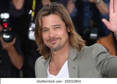 CANNES, FRANCE - MAY 22: Brad Pitt poses at the 'Killing Them Softly' photocall during the 65th Annual Cannes Film Festival at Palais des Festivals on May 22, 2012 in Cannes, France.