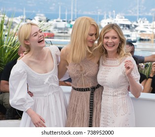 CANNES, FRANCE. May 24, 2017: Elle Fanning, Nicole Kidman & Kirsten Dunst at the photocall for "The Beguiled" at the 70th Festival de Cannes