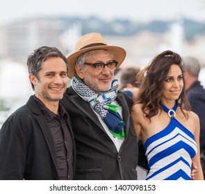 CANNES, FRANCE - MAY 24, 2019:  Gael García Bernal, Director Elia Suleiman And Yasmine Hamdan Attend The photocall For 