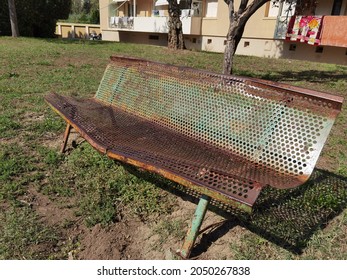 Cannes, France - September 30 2021 : An Old Metal Bench In A Park