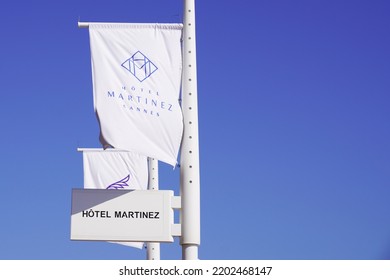 Cannes , Paca  France - 08 09 2022 : Martinez La Plage Sign Brand And Text Logo On Flag Beach Club At The Croisette In Cannes