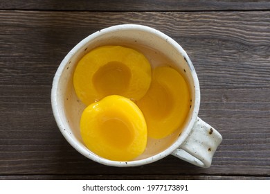 Canning Peaches Isolated In A White Bowl