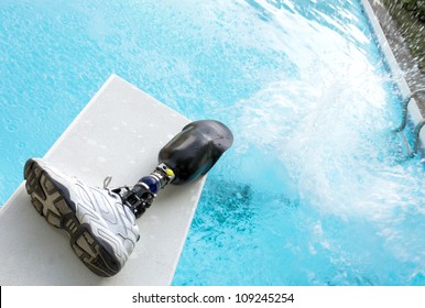 Cannonball Splash In A Pool With Prosthetic Leg Left On Diving Board.