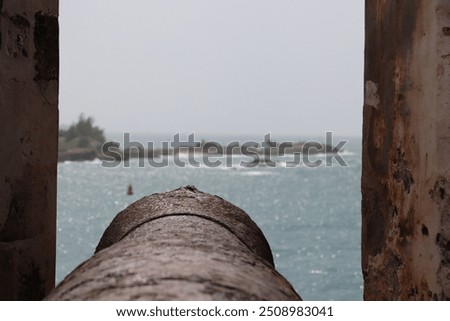 Cannons ready by the wall at National Park Castillo de San Felipe el Morro fort in Old San Juan, Puerto Rico