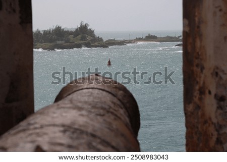 Cannons ready by the wall at National Park Castillo de San Felipe el Morro fort in Old San Juan, Puerto Rico
