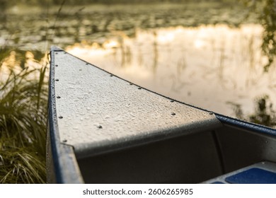 A canoe at a forest lake. - Powered by Shutterstock - Get 15% off with code: PIKWIZARD15
