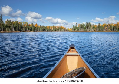 Canoe On A Blue Lake In Northern Minnesota During Autumn