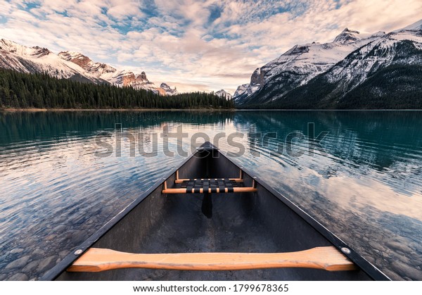 Canoeing with Canadian Rockies in\
Spirit Island on Maligne Lake at Jasper national park,\
Canada