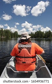 Canoeing On Lake One In The Boundary Waters Canoe Area  Wilderness.