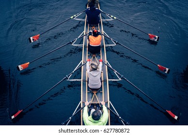 Canoeing team in amsterdam - Shutterstock ID 627780872
