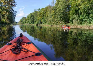 Canoeing Trip On The River. Rafting In Kayaks. Active Recreation On The Water.