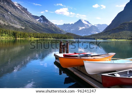 Canoes by lake Mc Donald in Glacier national park