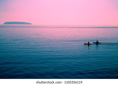 Canoes In Front Of Steep Holm Island In The Severn Estuary