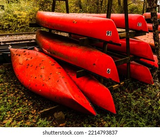 Canoes On A Rack In The Chatahoochee Nature Park In Sandy Springs, GA On A Overcast Day In Early Fall.