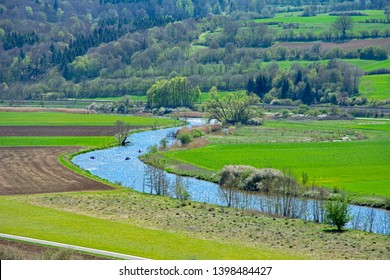 Canoes On The Winding River Altmuehl In Bavaria (Germany)