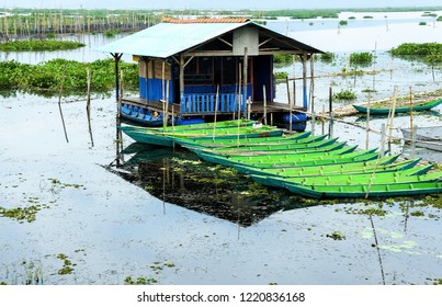 Canoes shelter at the lake - Powered by Shutterstock